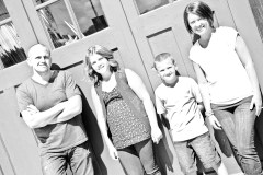 Barringer black and white against the green wall