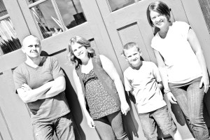 Barringer black and white against the green wall